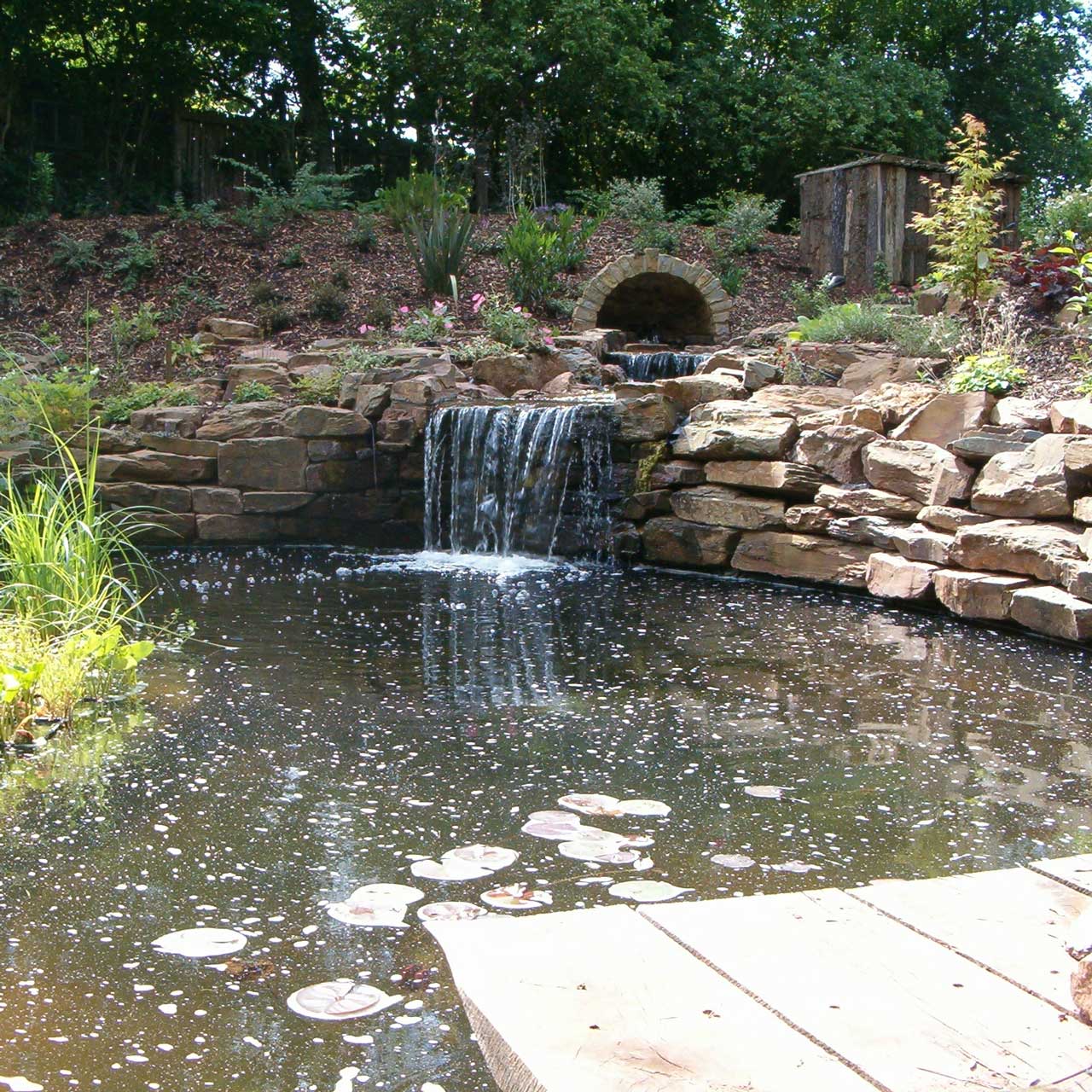 Large water feature in a garden design near Bristol, Somerset
