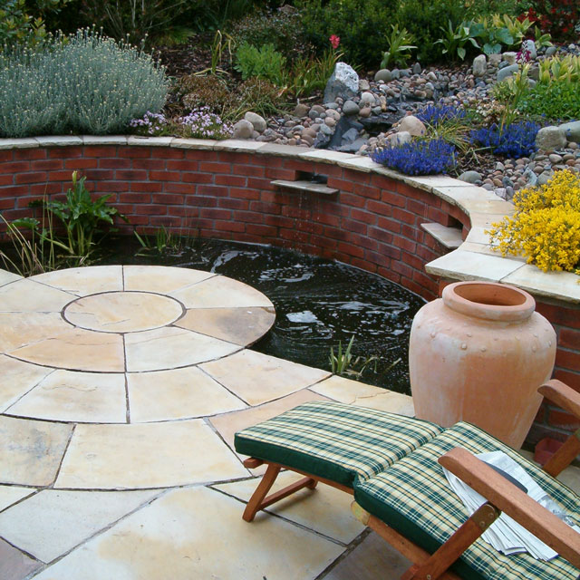 Water feature design with cascading streams in garden in Portishead, near Bristol